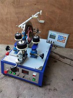 Toroidalwickelmaschine mit Seitenschlitten